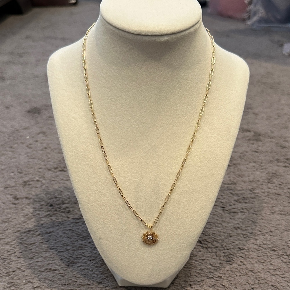 Joy Dravecky Elegant Gold Necklace With Sunburst Evil Eye Pendant
